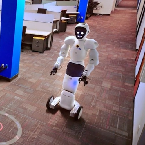 EvoGuard by Everon robot patrolling hallway