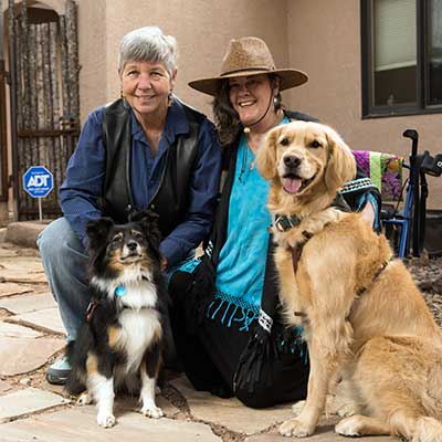 Pamela Dean and Karen Fielding with their support dogs.
